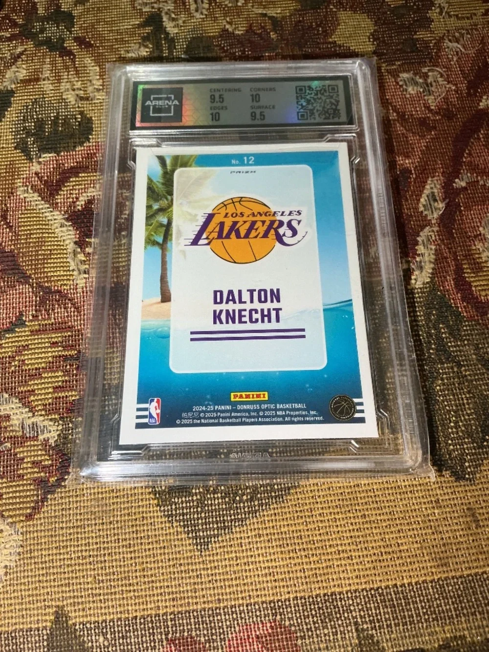 2024-25 Panini Donruss Optic Splash Dalton Knecht #12 Holo rookie grade Arena 10